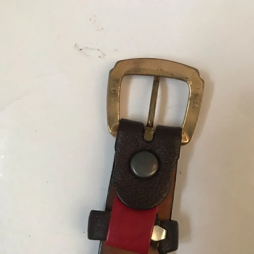 Brown leather belt with brass buckle